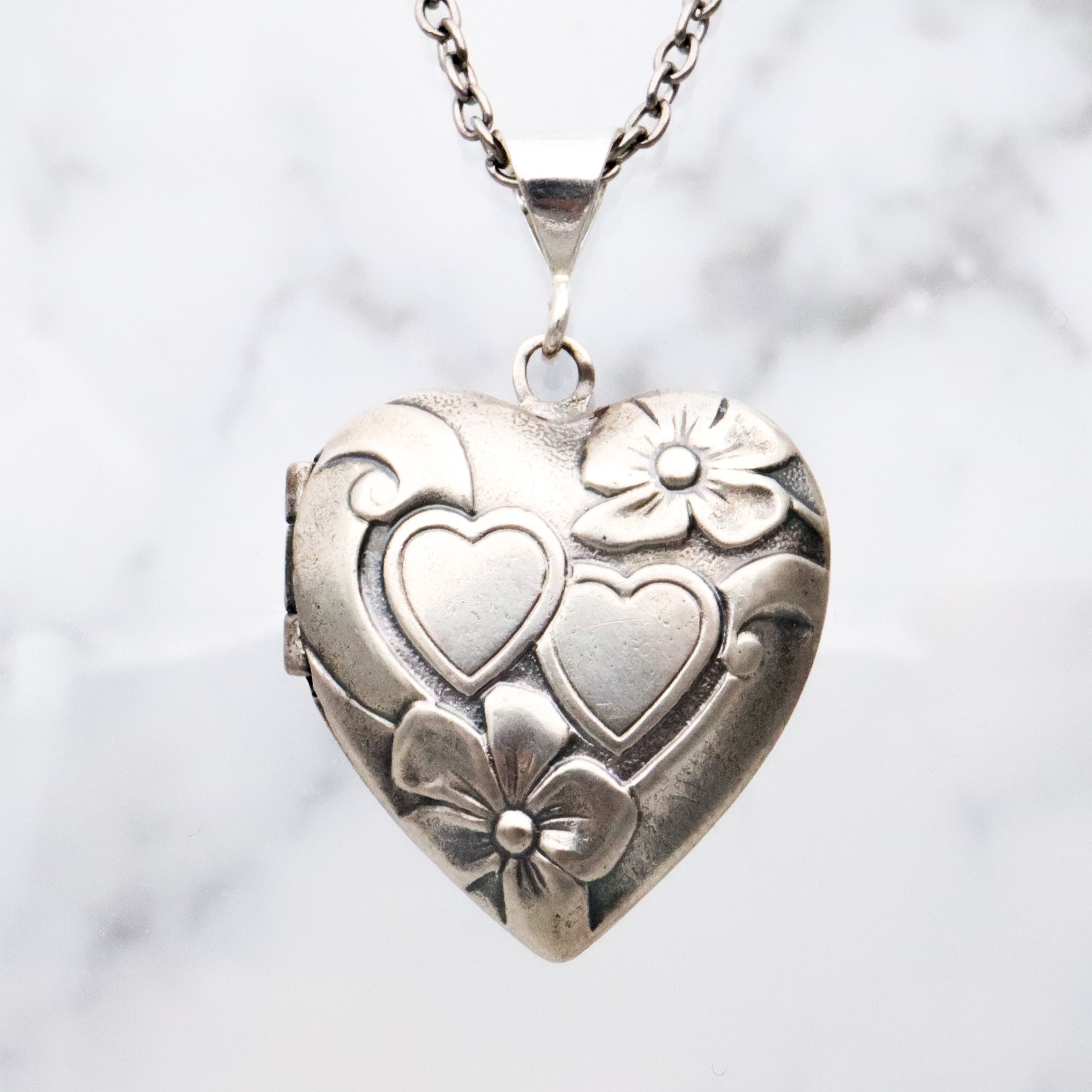 Antique sterling sweetheart locket pendant
